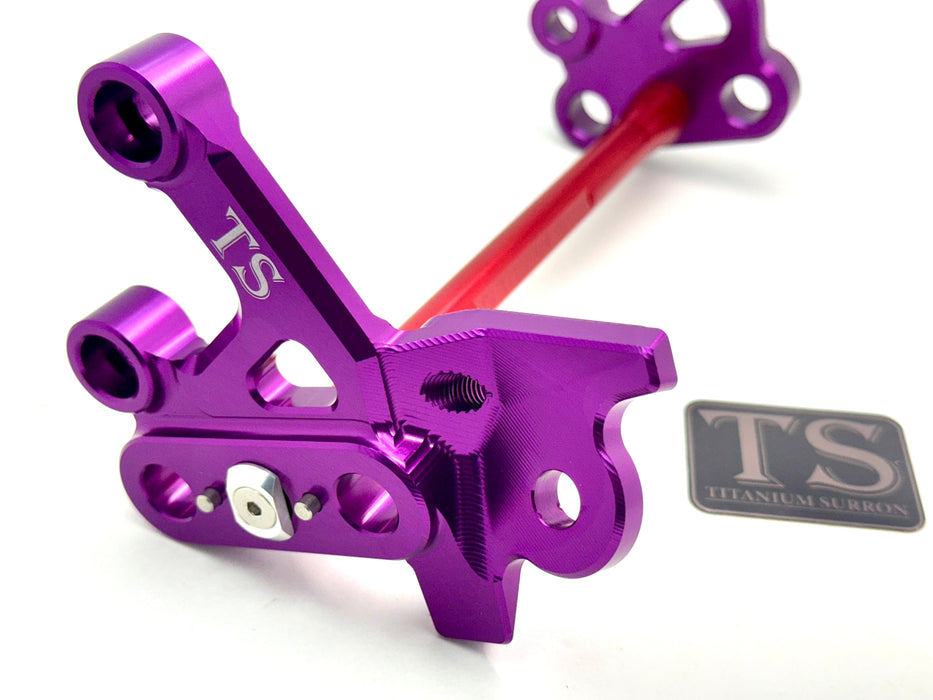 Titanium Surron Custom CNC Aluminum Footpeg Bracket Assembly Surron Red / Purple Footpeg bracket assembly LBX