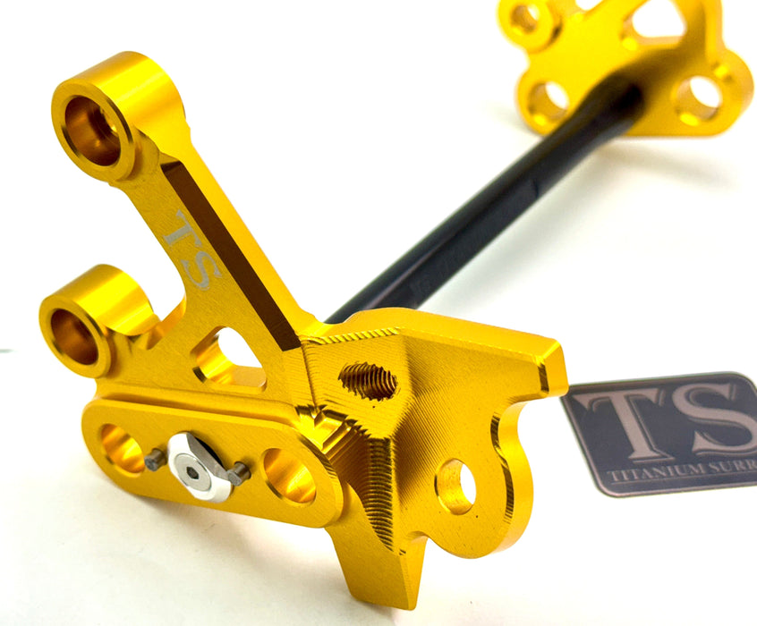 Titanium Surron Custom CNC Aluminum Footpeg Bracket Assembly Surron Black / Gold Footpeg bracket assembly LBX