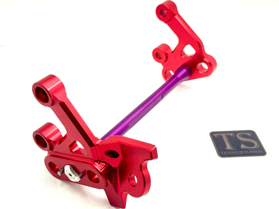 Titanium Surron Custom CNC Aluminum Footpeg Bracket Assembly Surron Purple / Red Footpeg bracket assembly LBX