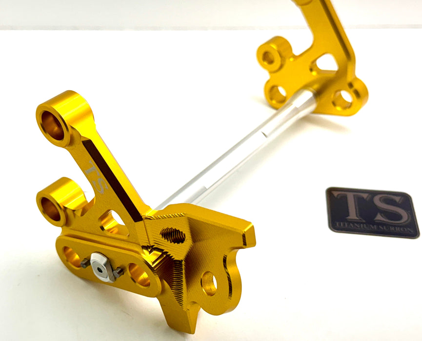 Titanium Surron Custom CNC Aluminum Footpeg Bracket Assembly Surron Silver / Gold Footpeg bracket assembly LBX