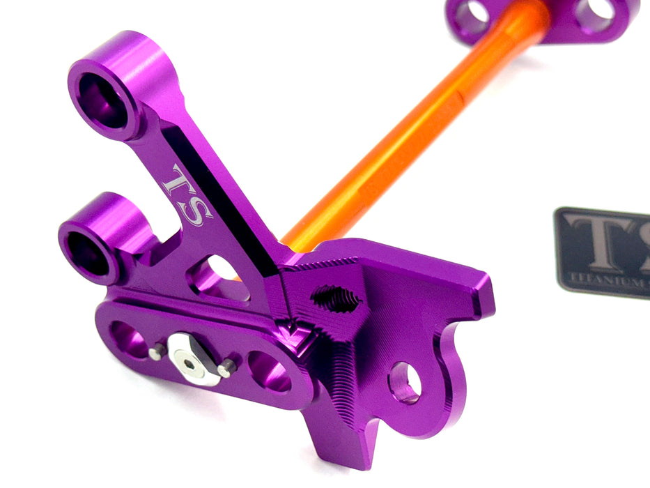 Titanium Surron Custom CNC Aluminum Footpeg Bracket Assembly Surron Burnt Orange / Purple Footpeg bracket assembly LBX