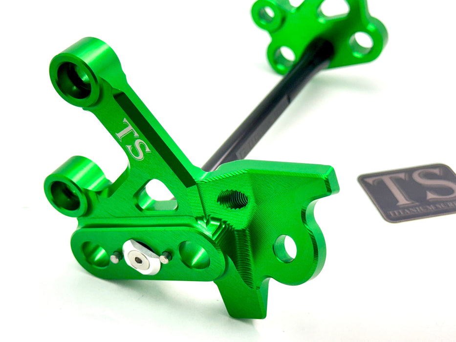 Titanium Surron Custom CNC Aluminum Footpeg Bracket Assembly E-Ride Pro SS and S Green / Black Footpeg bracket assembly