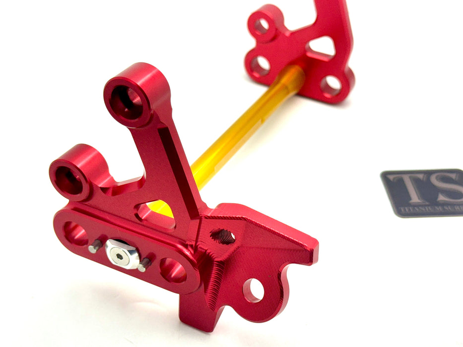 Titanium Surron Custom CNC Aluminum Footpeg Bracket Assembly Surron Gold / Red Footpeg bracket assembly LBX