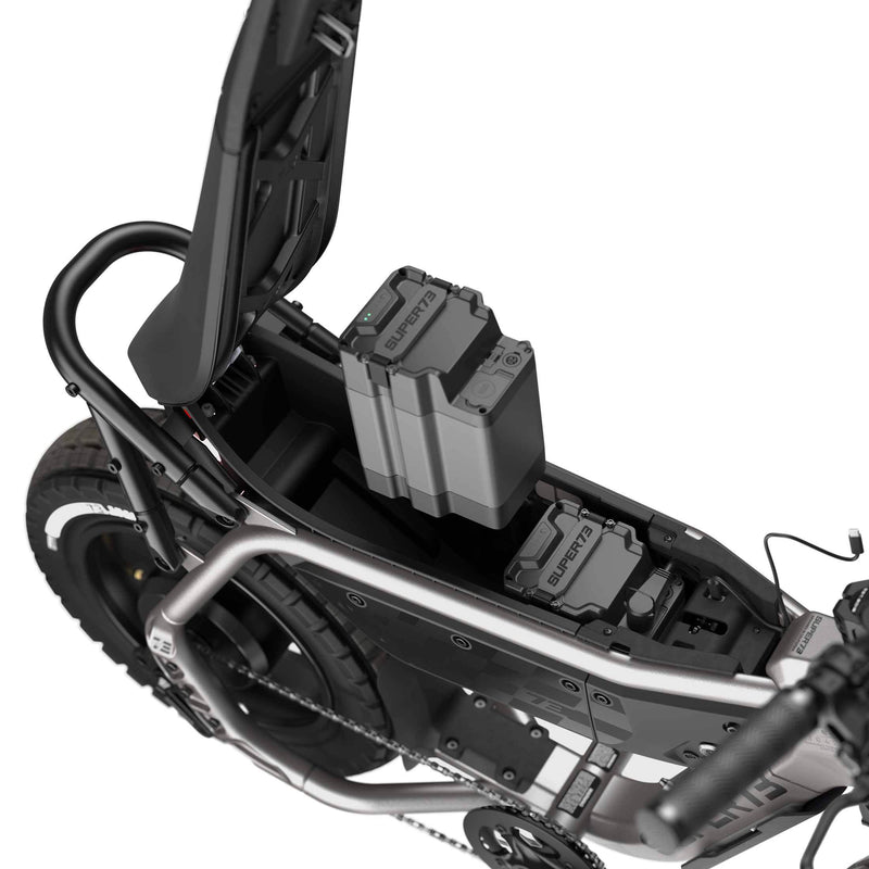 Detail image of the dual battery system on the SUPER73-MZFT ebike in Titanium Ore. @color_titanium ore