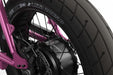 Studio image showing the removable battery and seat on the SUPER73-ZX in Prickly Pink. @color_prickly pink