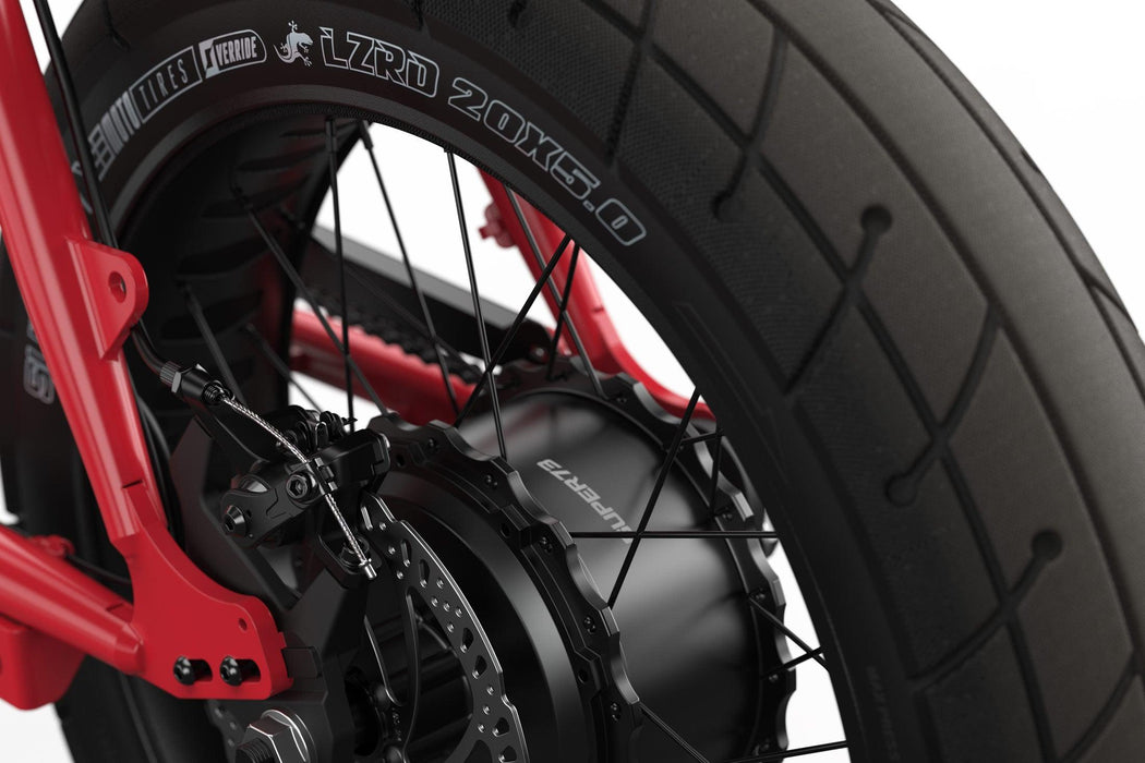 Studio image showing a close-up of the LZRD tires on the SUPER73-ZX in Sriracha. @color_sriracha