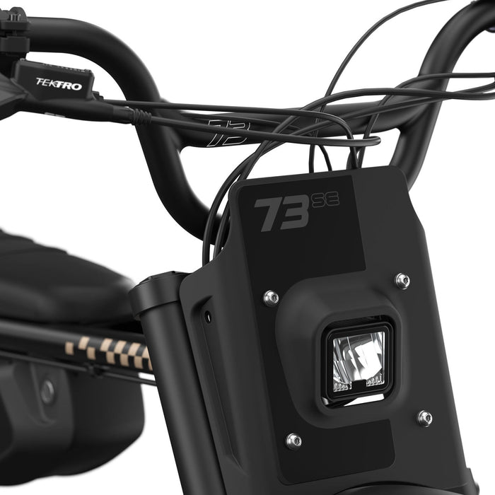 Detail image of the handlebars and headlight on the SUPER73-Z Adventure SE ebike in Bandit. @color_bandit