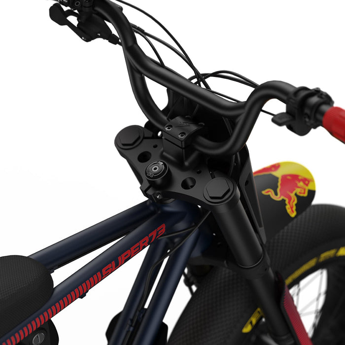 Detail image showing the special edition branded stem cap on the Oracle Red Bull Racing Z Adv Series ebike in Midnight Blue. @color_midnight blue