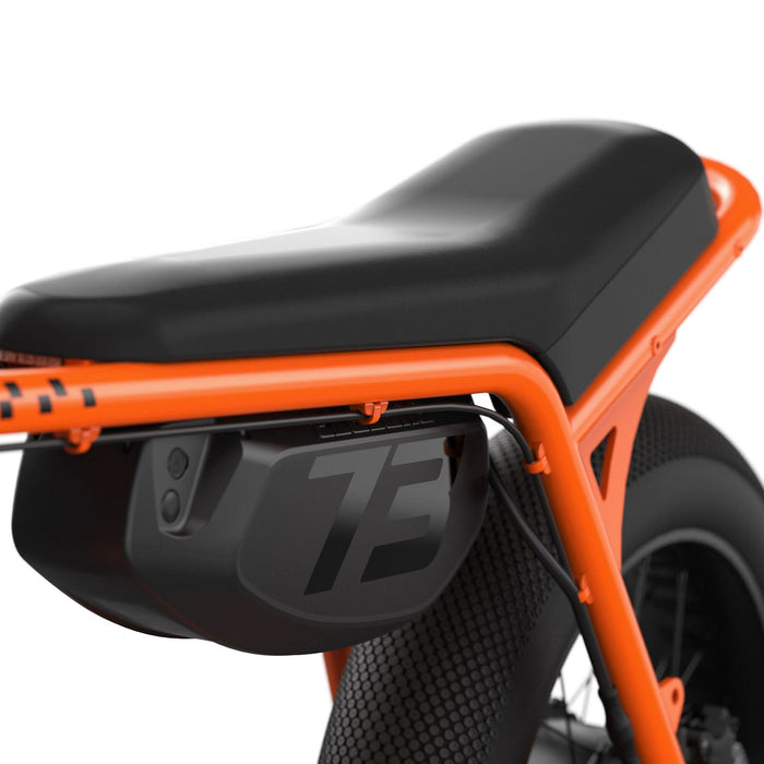 Studio image showing the removable battery and seat on the SUPER73-Z Miami SE in Astro Orange. @color_astro orange