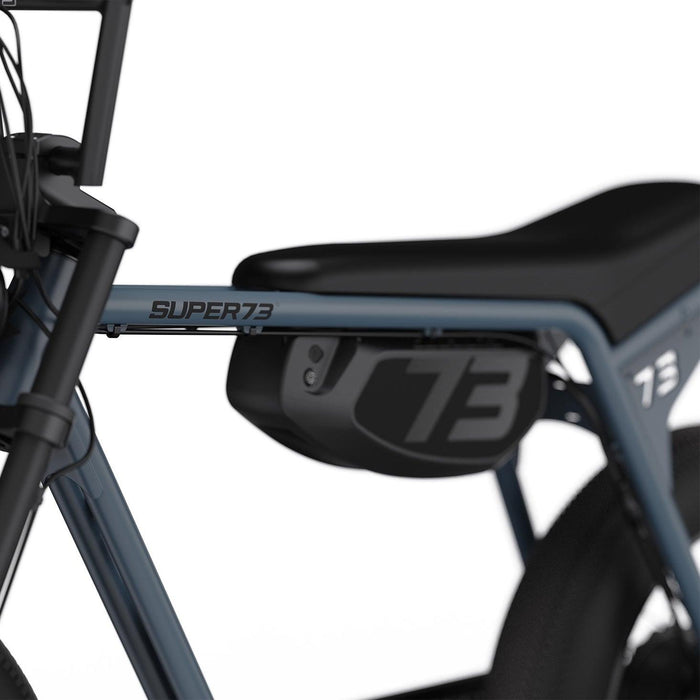 Detail image showing the removable battery on the SUPER73-ZX ebike in Panthro Blue. @color_panthro blue
