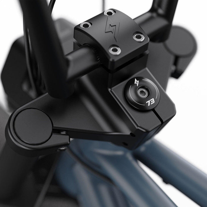 Detail image showing the branded stem cap on the SUPER73-ZX ebike in Panthro Blue. @color_panthro blue