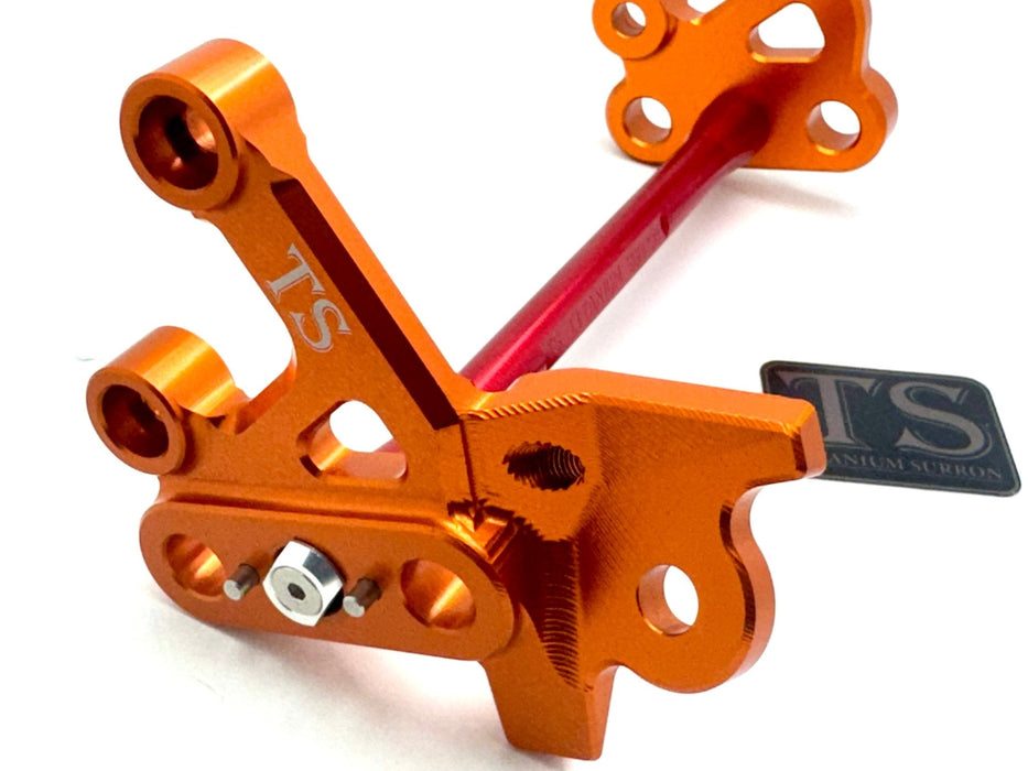 Titanium Surron Custom CNC Aluminum Footpeg Bracket Assembly Surron Red / Burnt Orange Footpeg bracket assembly LBX