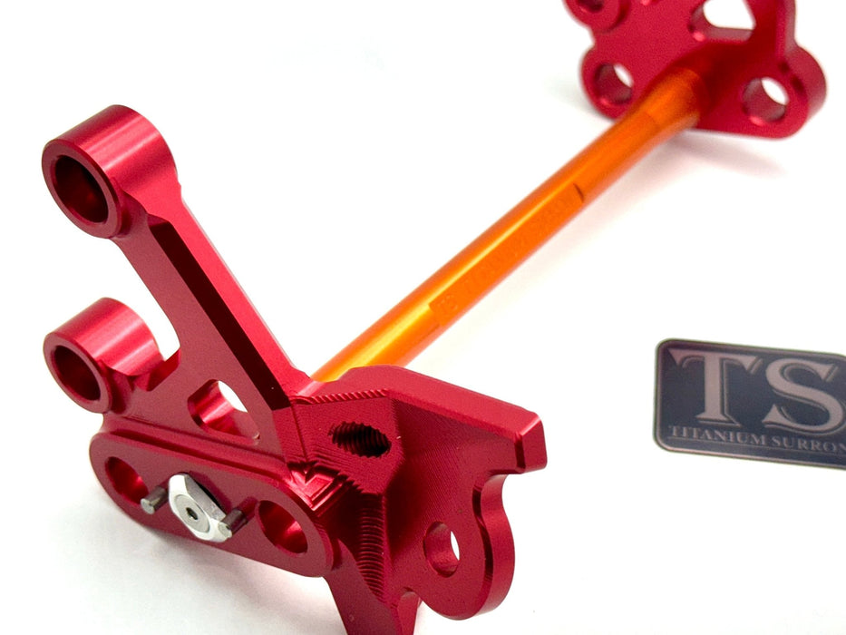 Titanium Surron Custom CNC Aluminum Footpeg Bracket Assembly Surron Burnt Orange / Red Footpeg bracket assembly LBX