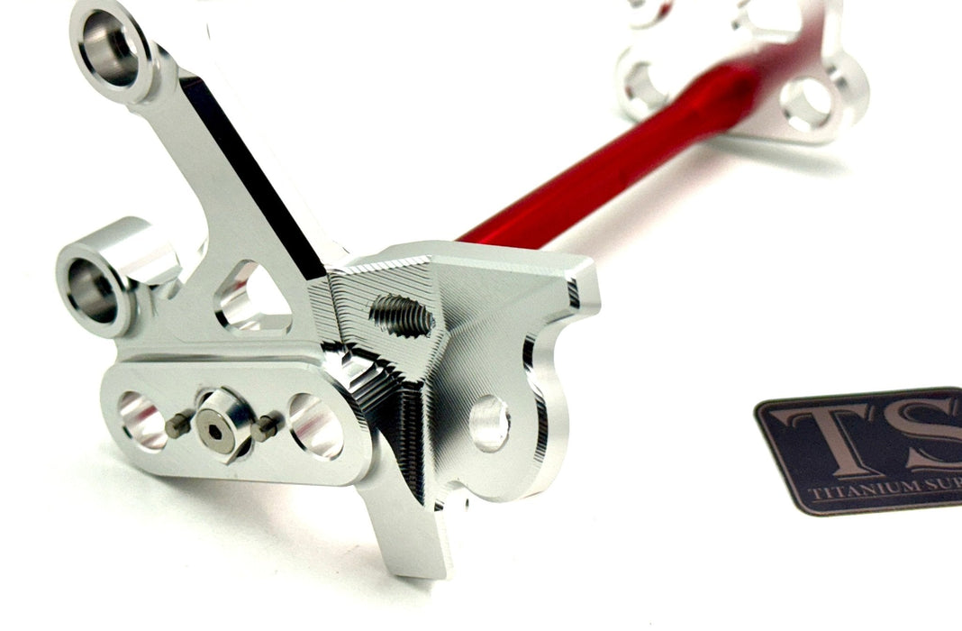 Titanium Surron Custom CNC Aluminum Footpeg Bracket Assembly Surron Red / Silver Footpeg bracket assembly LBX