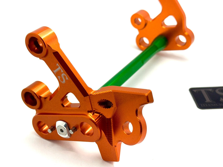 Titanium Surron Custom CNC Aluminum Footpeg Bracket Assembly Surron Green / Burnt Orange Footpeg bracket assembly LBX