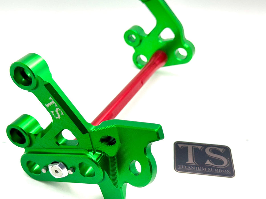 Titanium Surron Custom CNC Aluminum Footpeg Bracket Assembly Surron Red / Green Footpeg bracket assembly LBX