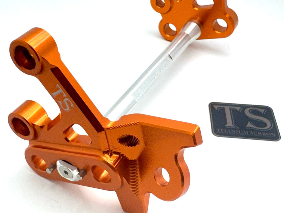 Titanium Surron Custom CNC Aluminum Footpeg Bracket Assembly Surron Silver / Burnt Orange Footpeg bracket assembly LBX