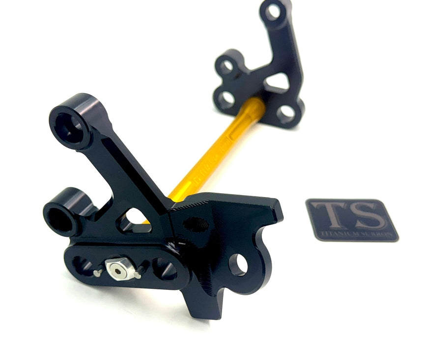 Titanium Surron Custom CNC Aluminum Footpeg Bracket Assembly Surron Gold / Black Footpeg bracket assembly LBX