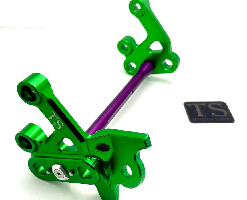 Titanium Surron Custom CNC Aluminum Footpeg Bracket Assembly Surron Purple / Green Footpeg bracket assembly LBX