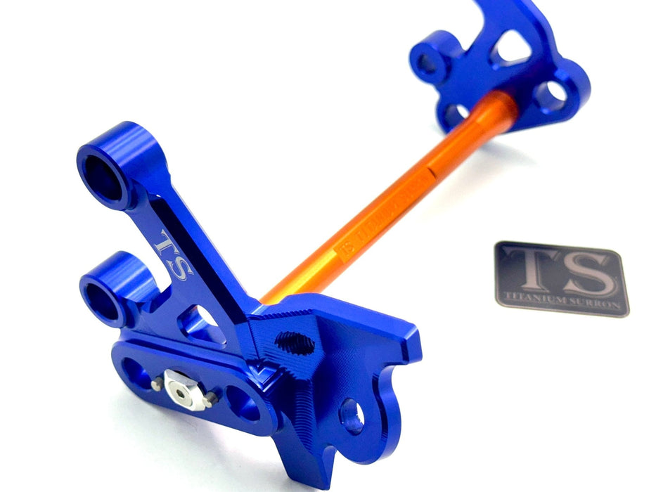 Titanium Surron Custom CNC Aluminum Footpeg Bracket Assembly Surron Burnt Orange / Blue Footpeg bracket assembly LBX
