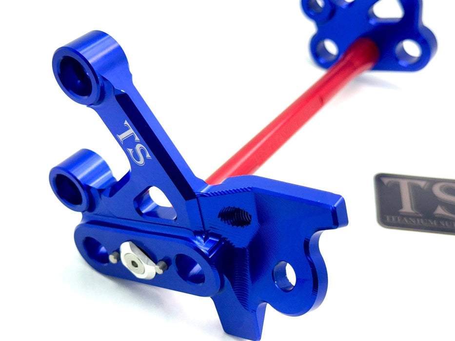 Titanium Surron Custom CNC Aluminum Footpeg Bracket Assembly Surron Red / Blue Footpeg bracket assembly LBX