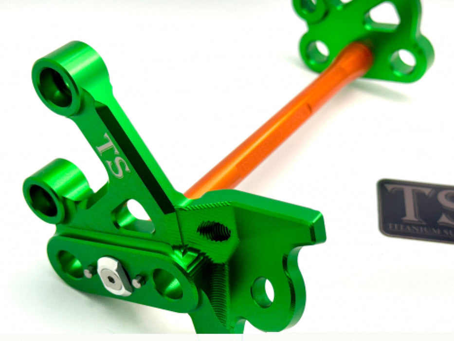 Titanium Surron Custom CNC Aluminum Footpeg Bracket Assembly Surron Burnt Orange / Green Footpeg bracket assembly LBX