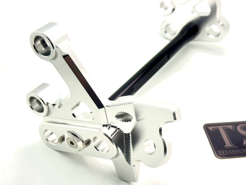 Titanium Surron Custom CNC Aluminum Footpeg Bracket Assembly Surron Black / Silver Footpeg bracket assembly LBX
