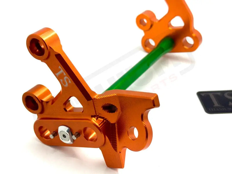 TS Custom CNC Aluminum Footpeg Bracket Assembly E-Ride Pro SS and S - Burnt Orange / Green - Footpeg bracket assembly