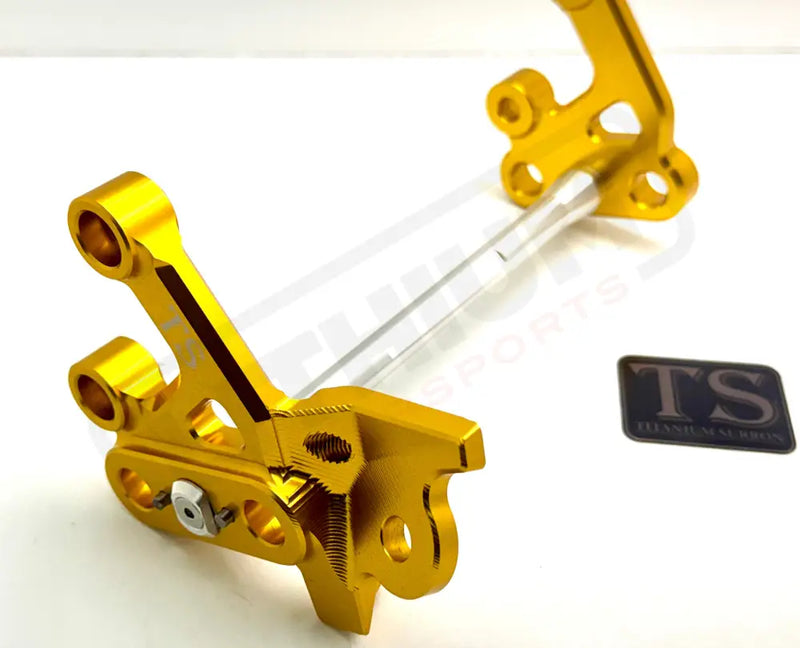 TS Custom CNC Aluminum Footpeg Bracket Assembly Surron - Gold / Silver - Footpeg bracket assembly LBX