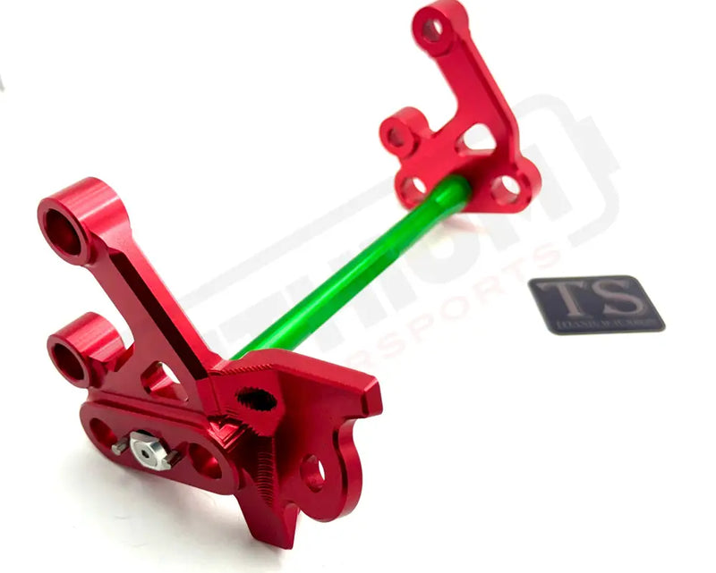 TS Custom CNC Aluminum Footpeg Bracket Assembly Surron - Red / Green - Footpeg bracket assembly LBX